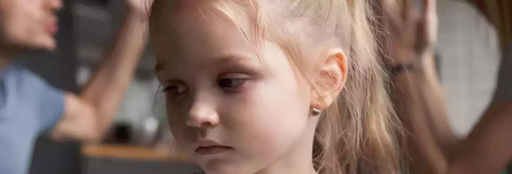 Child between parents arguing