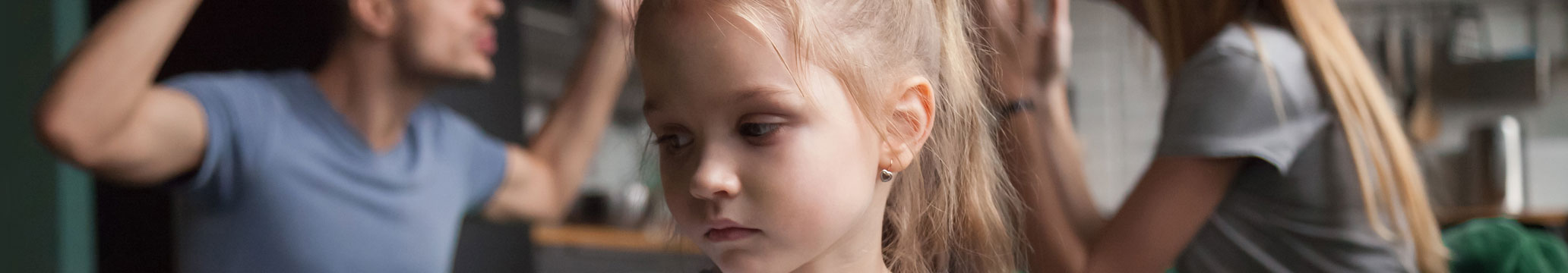 Child between parents arguing