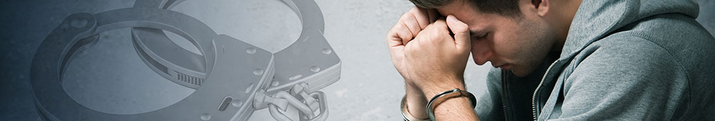 
Young man in handcuffs